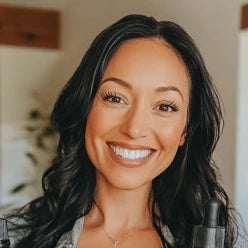 files/issa3110_A_woman_in_her_late_thirties_smiling_and_holding_two_b_fa075156-2cb1-45eb-bb1c-a8bf1b2fc692.webp